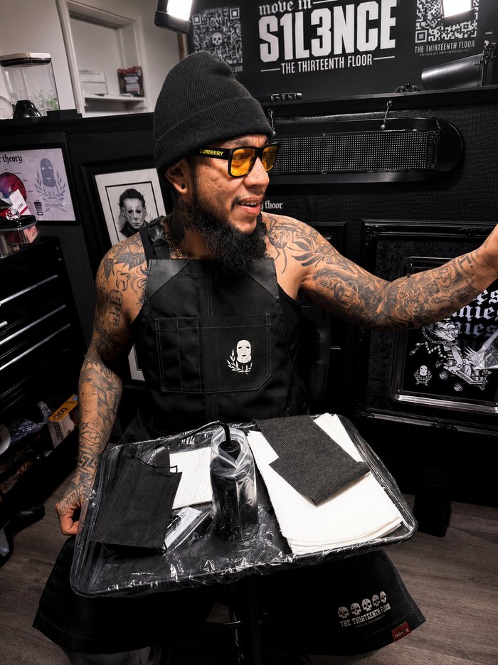Tanchez setting up a tattoo station at The Thirteenth Floor