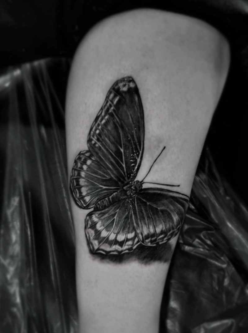 Butterfly tattoo, The Thirteenth Floor Tattoo Lounge