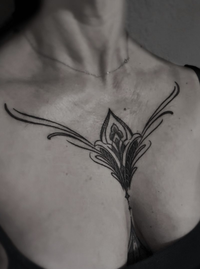 Chest Dagger tattoo, The Thirteenth Floor Tattoo Lounge